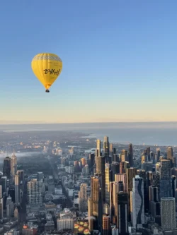 Morning hot air balloon flight over the city of Melbourne